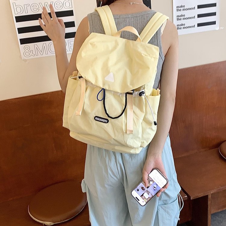 Cute forest girl with breasts exhaling for travel, small backpack for college students, fashionable and simple candy color backpack