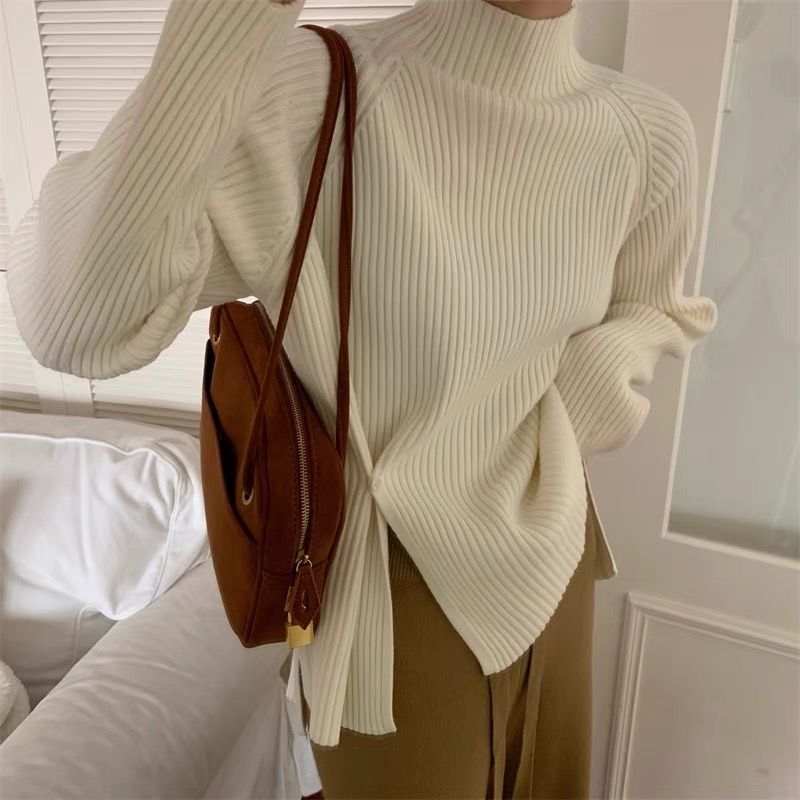 Hot girl half turtleneck long-sleeved sweater for women in autumn and winter design niche slit irregular bottoming shirt with a western style