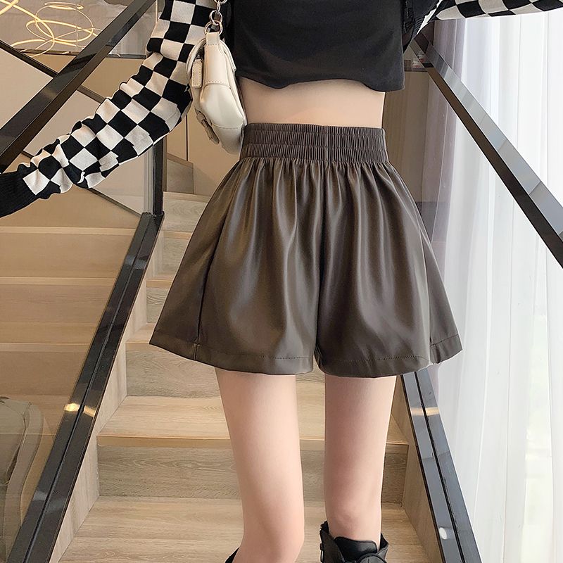 The new Korean version of the high waist is thin, loose, waist skin, short pants, wide leg pants, wild boots