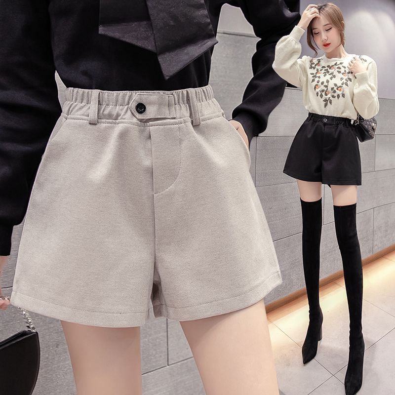 Large size women's clothing autumn and winter new fat mm pants are thin, loose, tight waist hair, woolen shorts, wearing boots pants tide