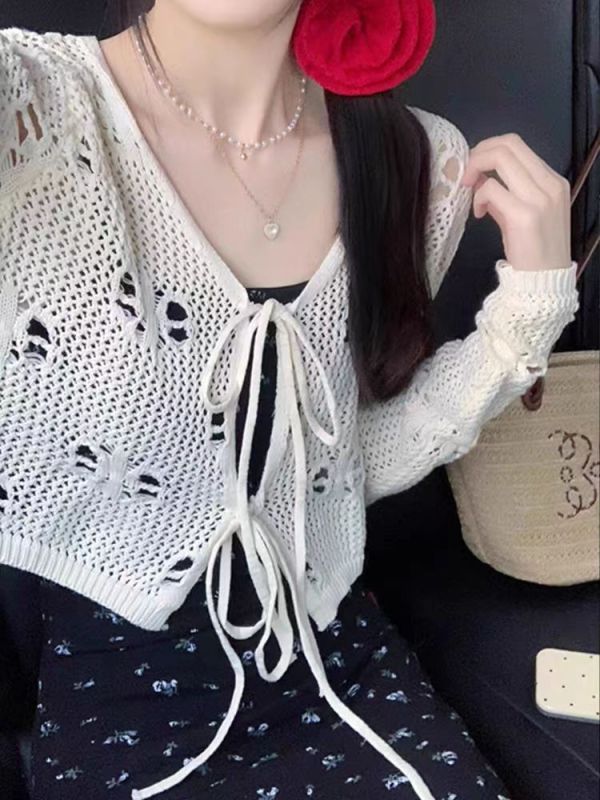 2025 new spring and summer hollow thin style outside French sunscreen knitted cardigan women's design niche blouse top