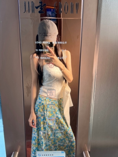 Design-sensory halter neck drawstring top long strap floral skirt two-piece set