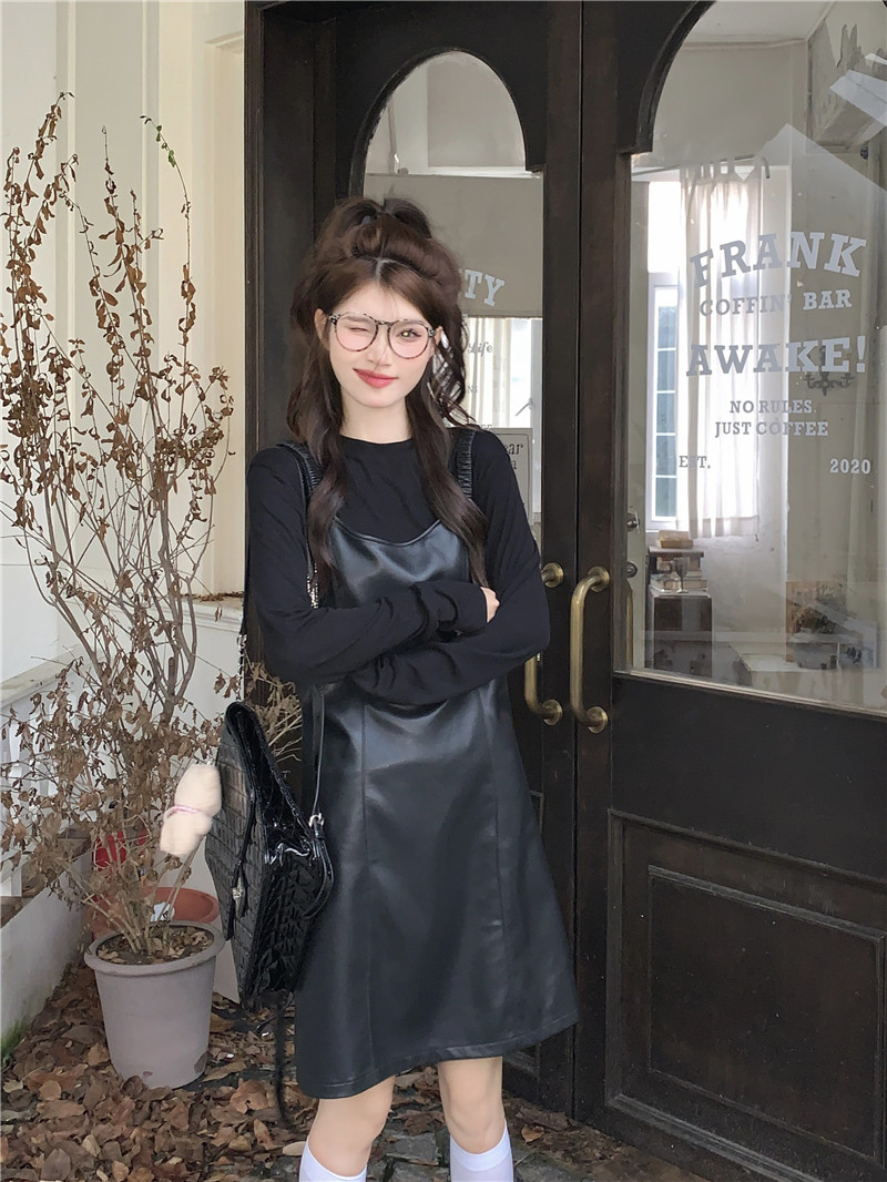 Real shot, high-end solid color temperament, loose and slim pu leather suspender skirt, long-sleeved top two-piece suit