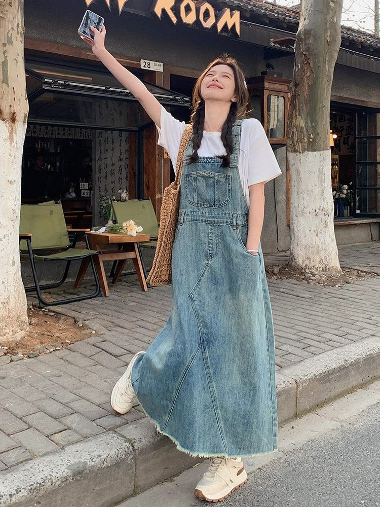 Hong Kong style retro literary denim strap long skirt for women in summer new Korean style loose and fashionable age-reducing Platycodon dress