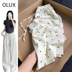 蝴蝶結波點奶白色休閒褲子女2025夏季新款寬鬆直筒遛彎闊腿褲子