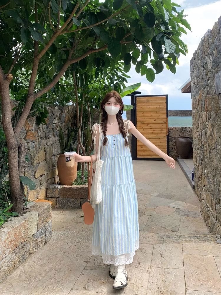 韓系藍色條紋綁帶吊帶連衣裙女夏季海邊度假長裙無袖寬鬆a字裙子