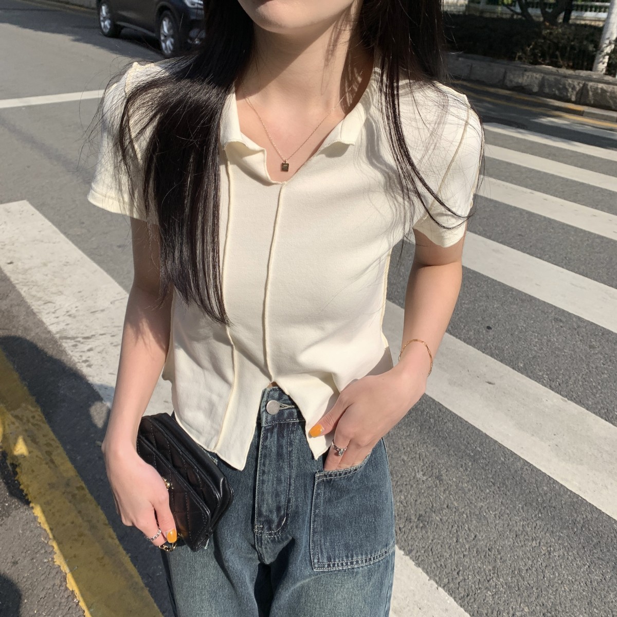 Real shot of the spring Korean version of versatile slit splicing design, fashionable short-sleeved women's top T-shirt