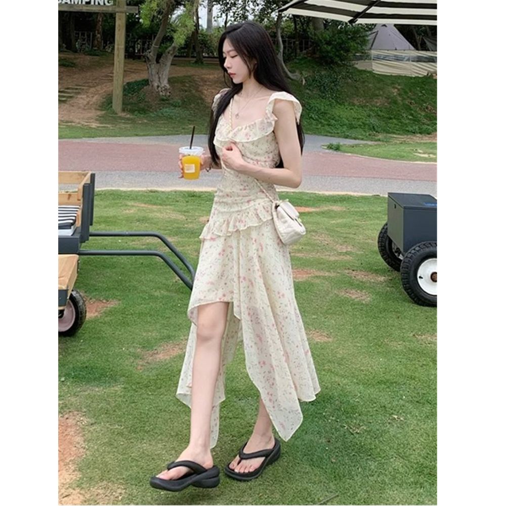 不規則碎花v領小飛袖吊帶連衣裙女夏度假風法式收腰顯瘦仙女長裙