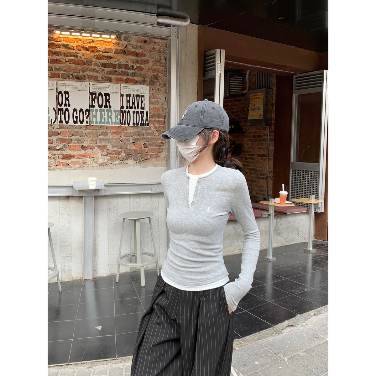 Real shot of spring Korean style, slim and contrasting color fake two-piece nail button design long-sleeved T-shirt top for women