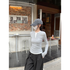 Real shot of spring Korean style, slim and contrasting color fake two-piece nail button design long-sleeved T-shirt top for women