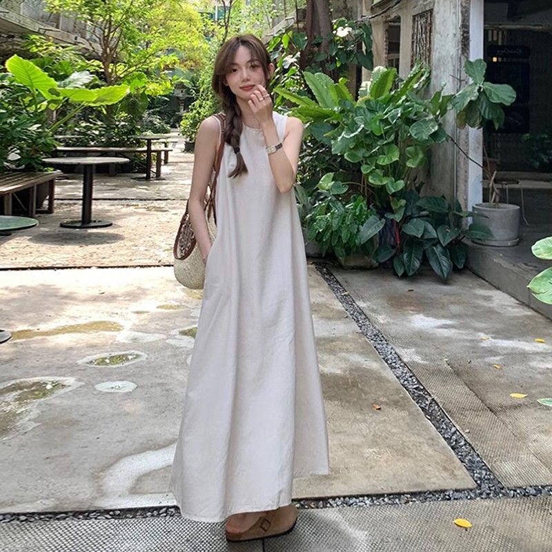 法式氣質無袖棉麻連衣裙女2025夏季新款設計感後背鏤空圓領背心裙