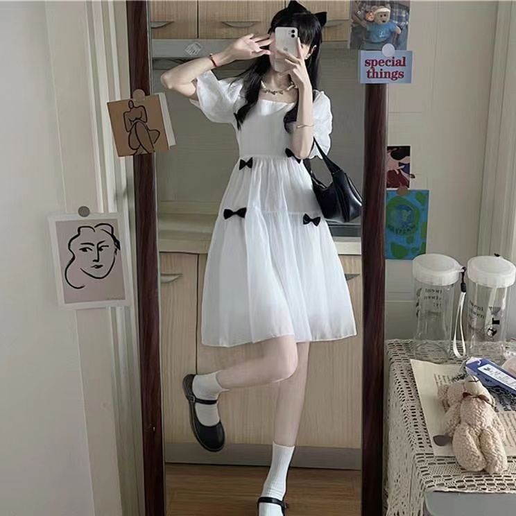 超仙森系白色泡泡袖蝴蝶結連衣裙少女設計感小眾法式初戀夏季收腰