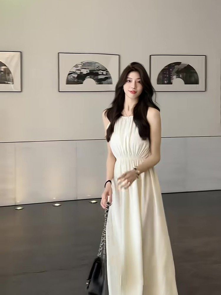 藍色法式掛脖吊帶連衣裙子女夏季新款海邊度假風無袖沙灘長裙
