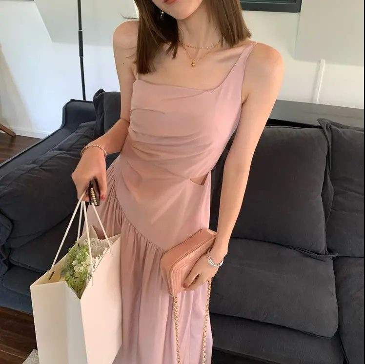 Irregular pleated suspender dress for women 2025 spring and summer new high-end light luxury waist-hugging long skirt
