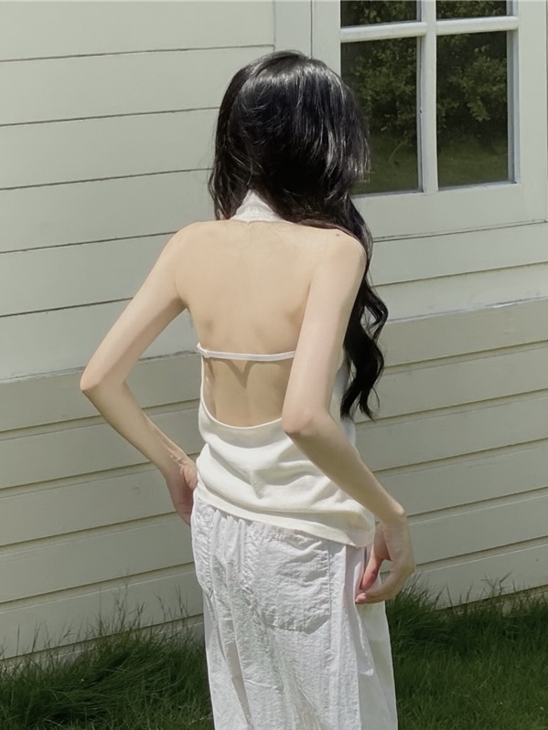 Real shot of a sleeveless vest top with hot girl knitted vest