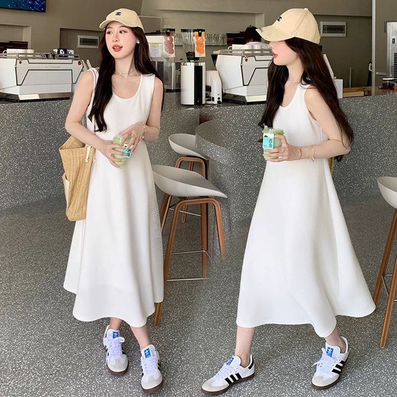 法式吊帶連衣裙女夏季收腰顯瘦過膝長裙小眾設計感碎花A字裙子潮