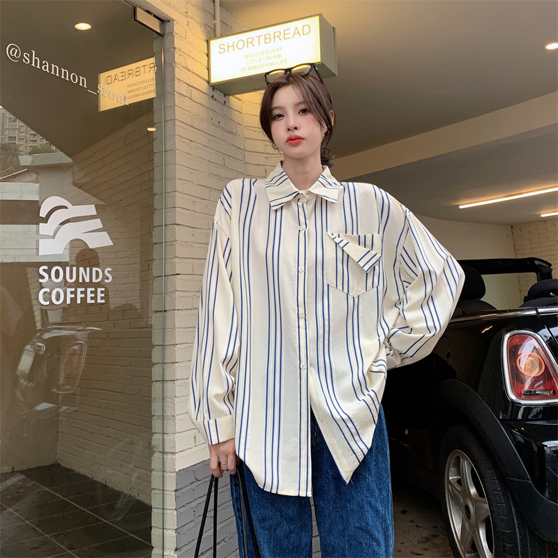 藍色條紋襯衫女春季2025年新款設計感小眾韓版休閒長袖襯衣