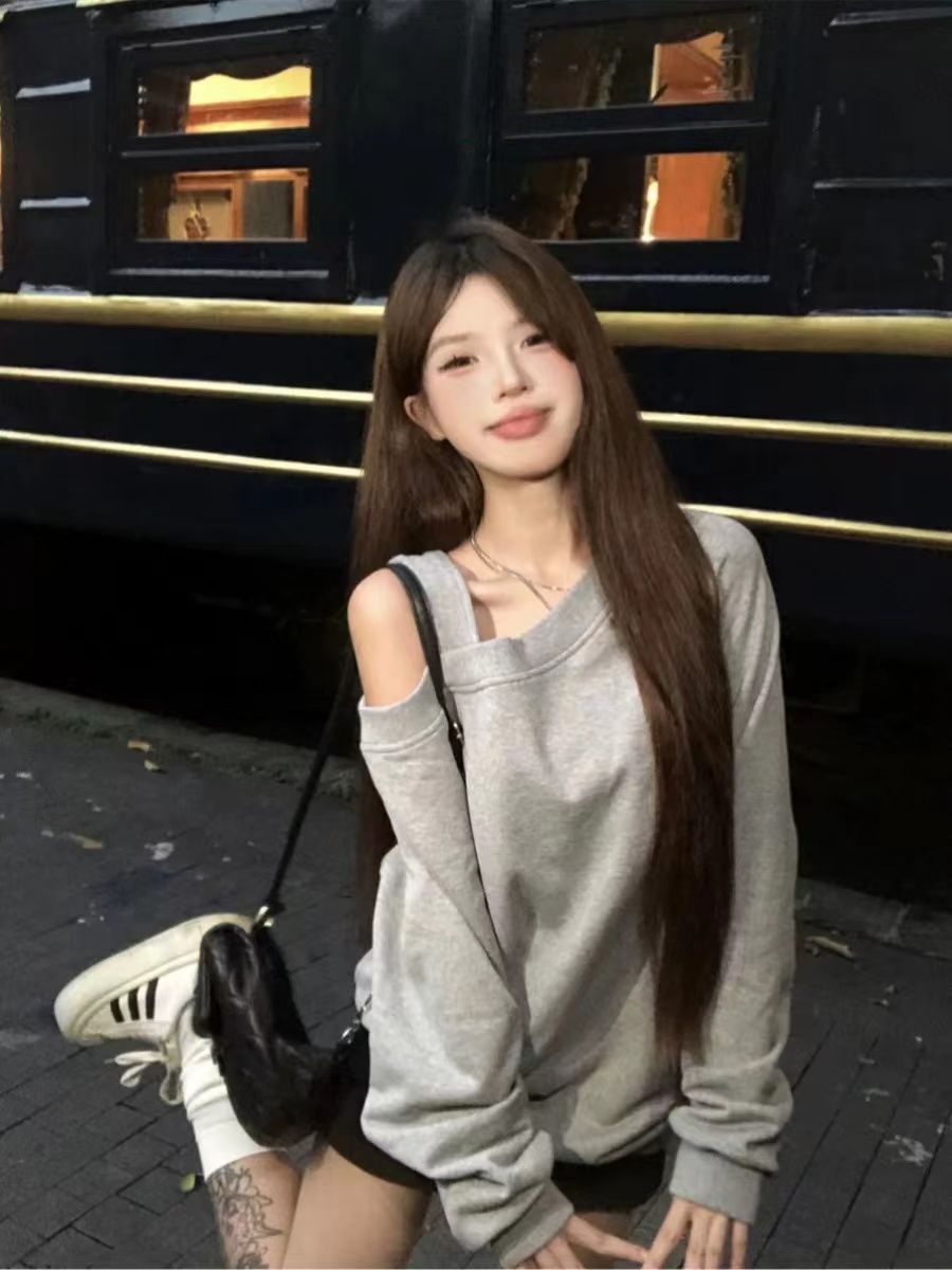 寬鬆斜肩上衣女春秋新款設計感小眾露肩衛衣