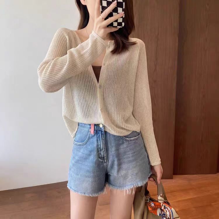 Summer's slightly transparent simple ice silk outer blouse top air conditioning shirt hollow knitted cardigan sun protection women's thin jacket