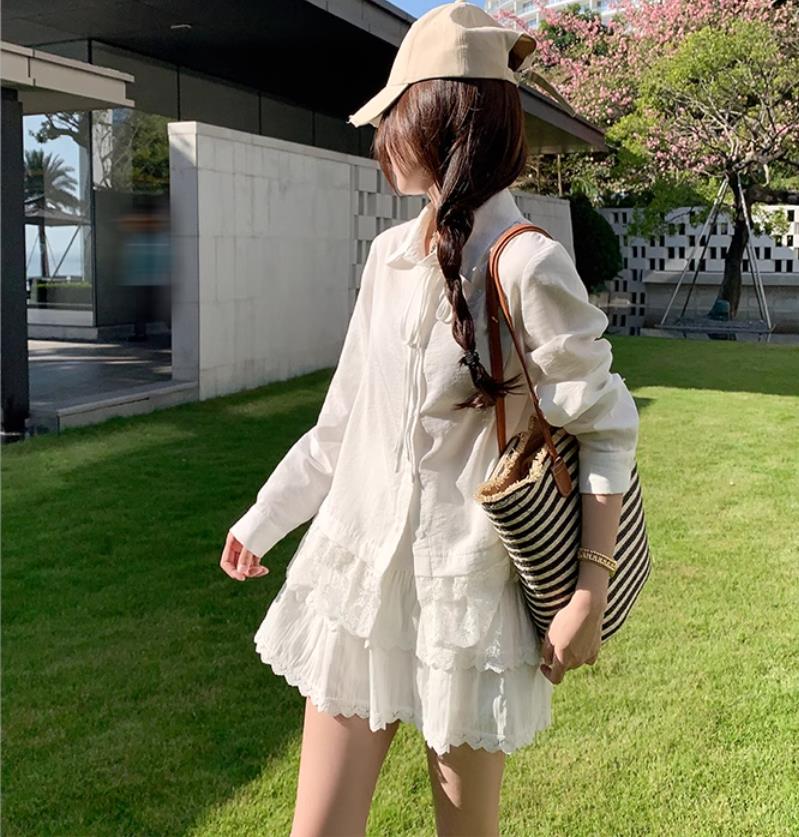Zeng Xiaoxian's design-sensing lace hem white shirt for women 2025 spring new products loose and versatile temperament shirt top