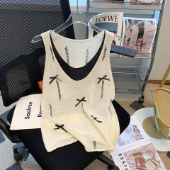 Real photo of bow hollow hole fake two-piece white sweater women's design niche rolled sleeveless top