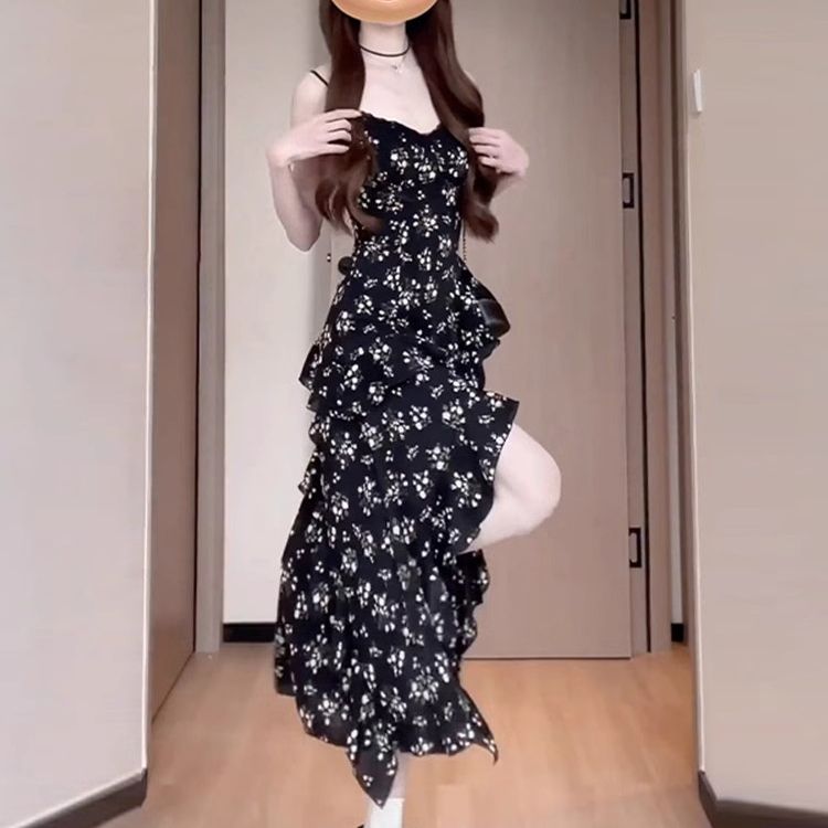 French temperament irregular long skirt 2025 new early spring cold black floral suspender dress for women
