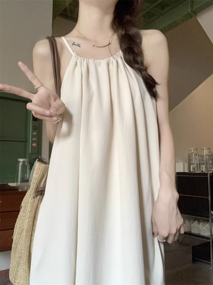 茶歇法式溫柔風吊帶連衣裙仙女超仙森系夏季寬鬆海邊度假沙灘裙子