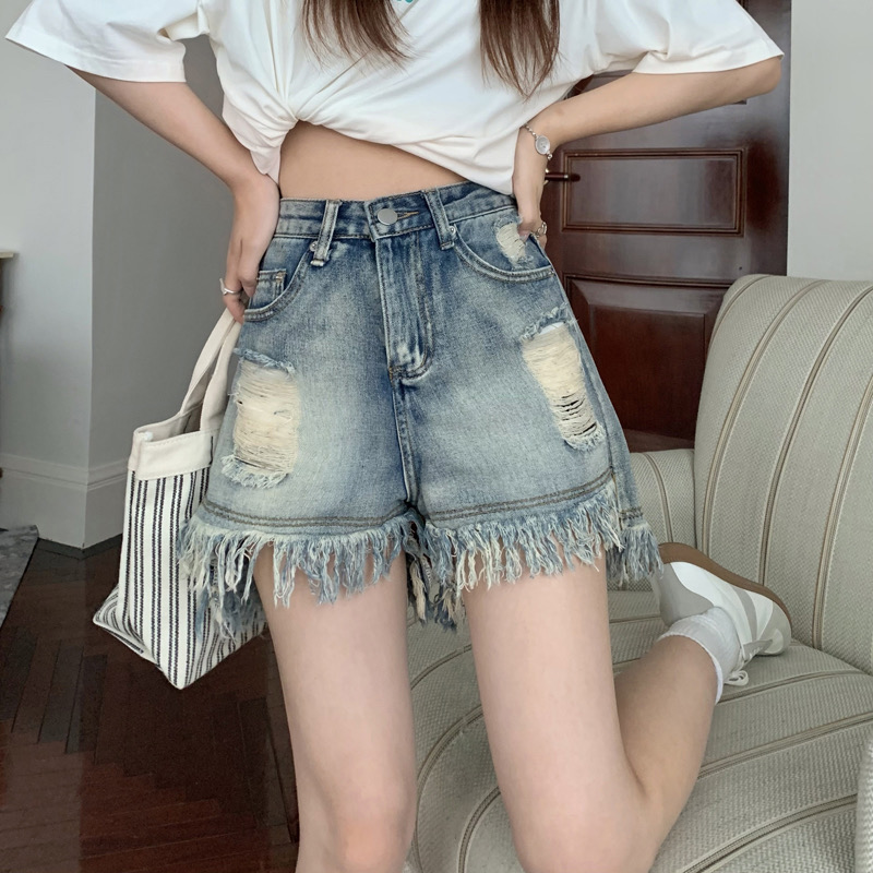 2025夏季新款高腰水洗復古牛仔褲女設計感小眾破洞毛邊MM短褲