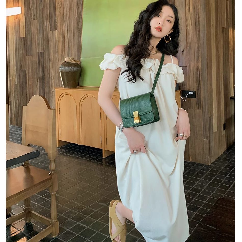 French off-shoulder apricot suspender dress for summer 2025 new ruffled one-shoulder temperament vacation skirt