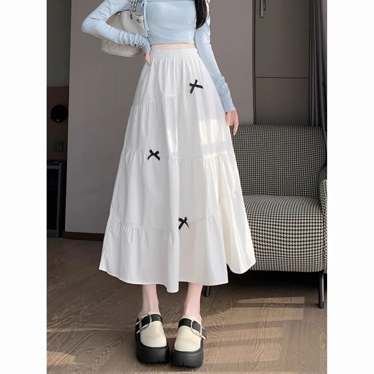 French Hepburn style bow skirt for women in autumn, small high-waisted A-line puffy skirt, slim and big umbrella skirt