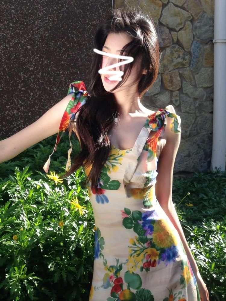 French temperament slim floral suspender dress for women in spring and summer long skirt 2025 new vacation travel outfit