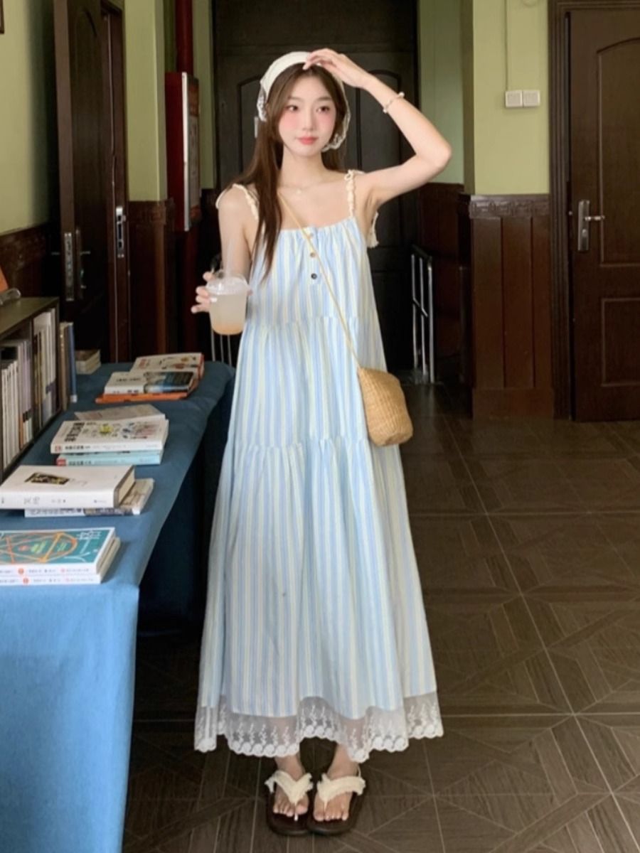 Seaside vacation striped suspender dress for women 2025 summer new French style loose small long skirt