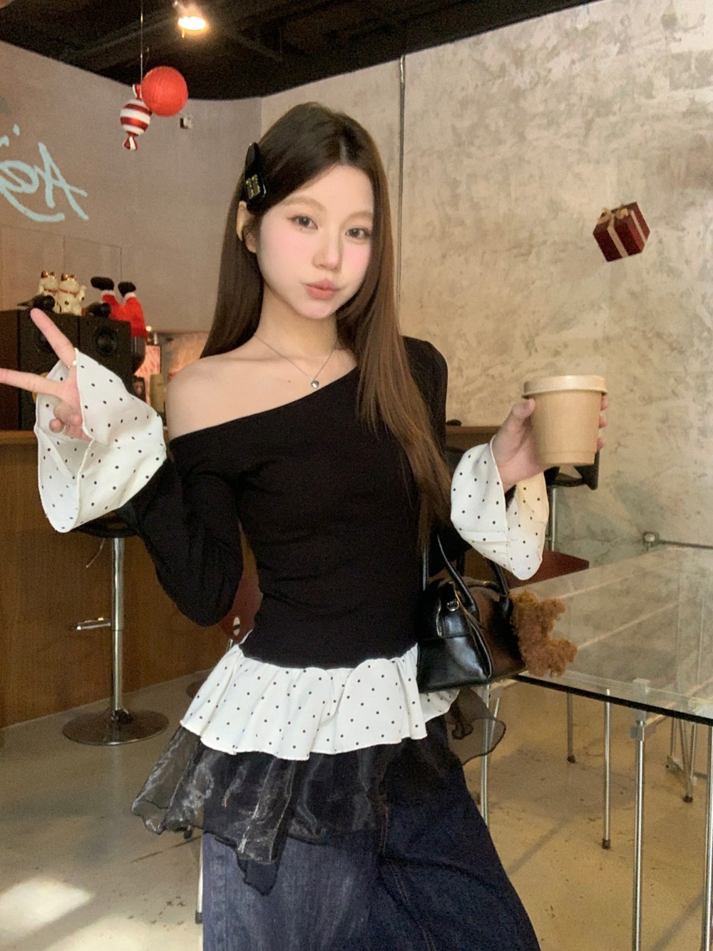 Real shot of black spliced ​​mesh polka dots slanted shoulder knitted base shirt for women