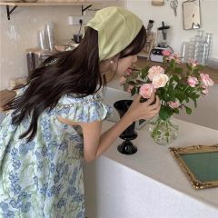 Gentle style floral suspender dress for women's summer design, loose mid-length skirt with ears