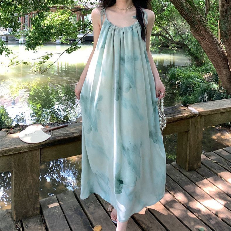 海邊度假扎染連衣裙女夏季法式a字寬鬆顯瘦沙灘裙無袖吊帶長裙子