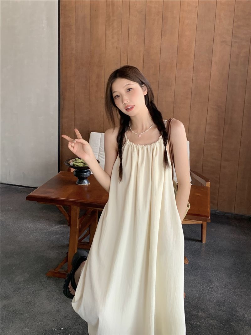 Summer solid color niche design feel sleeveless loose slim casual and simple A-line halter temperament long skirt dress