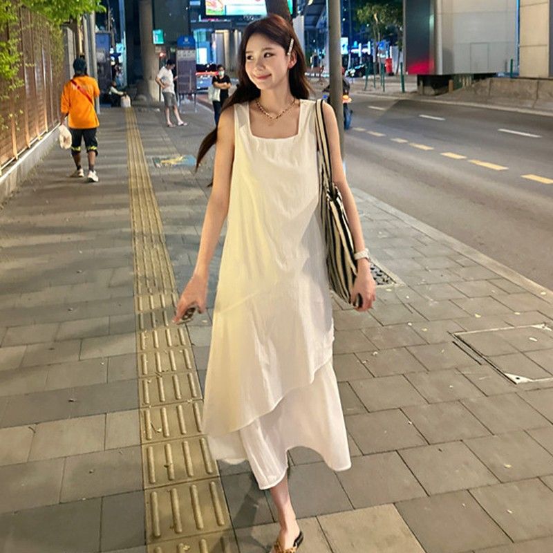 White vest skirt for women in summer 2025 new French loose design mid-length irregular suspender dress