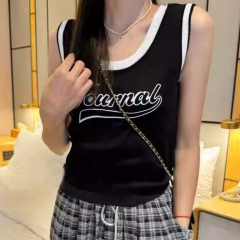 Korean contrasting color sleeveless knitted suspender for women in summer slim fit design sense back hollow back hot painted vest