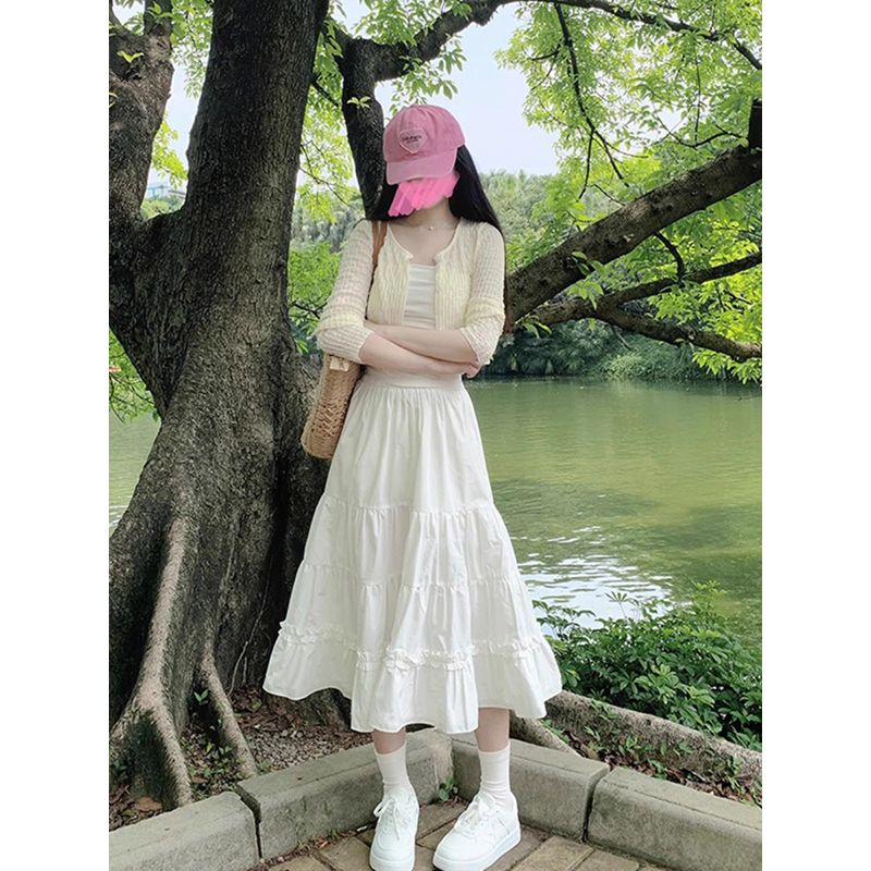 White skirt layered cake skirt for women in summer posing high waist tall versatile long skirt
