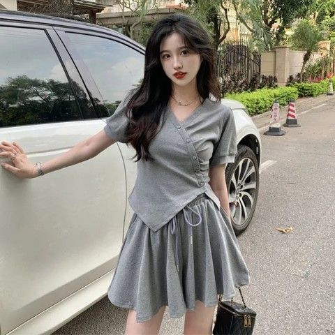 Two-piece set of irregular V-neck short-sleeved T-shirt in summer Korean new slim fit slim drawstring short suit for women