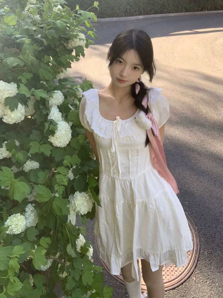 絕美別致純欲白色泡泡袖連衣裙女溫柔風小個子顯瘦收腰小眾短裙夏