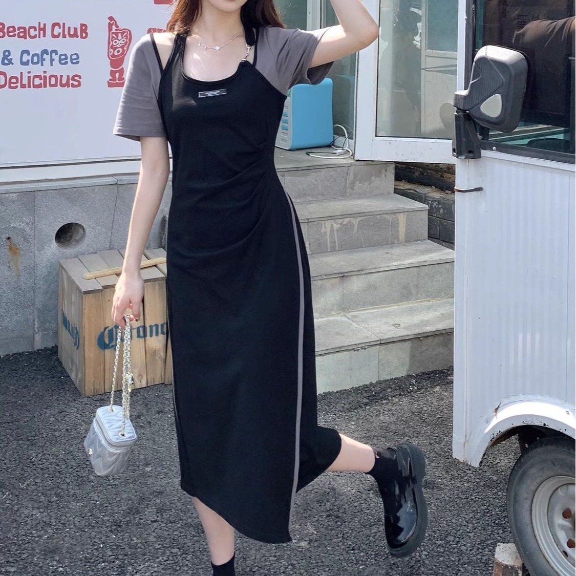 設計感時尚不規則開叉長裙子夏純欲辣妹風顯瘦掛脖假兩件連衣裙