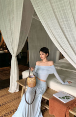 Real shot of a fashionable, pure and lustful hot girl slim and slim one-shoulder top skirt suit