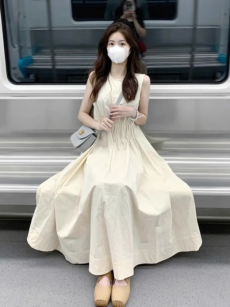 法式氣質亞麻杏色無袖背心連衣裙子女夏季2025新款溫柔風度假長裙