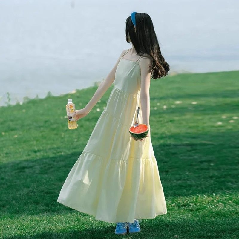 溫柔風森系超仙女黃色吊帶連衣裙子女夏季新款氣質收腰顯瘦長裙子
