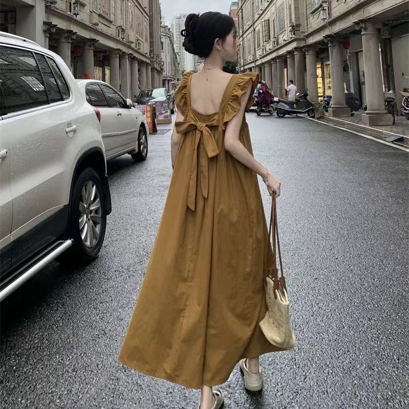甜美露背飛飛袖蝴蝶結綁帶連衣裙夏季新款度假遮肉顯瘦a字長裙子