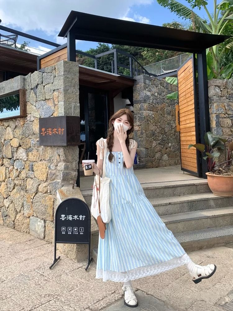 韓系藍色條紋綁帶吊帶連衣裙女夏季海邊度假長裙無袖寬鬆a字裙子
