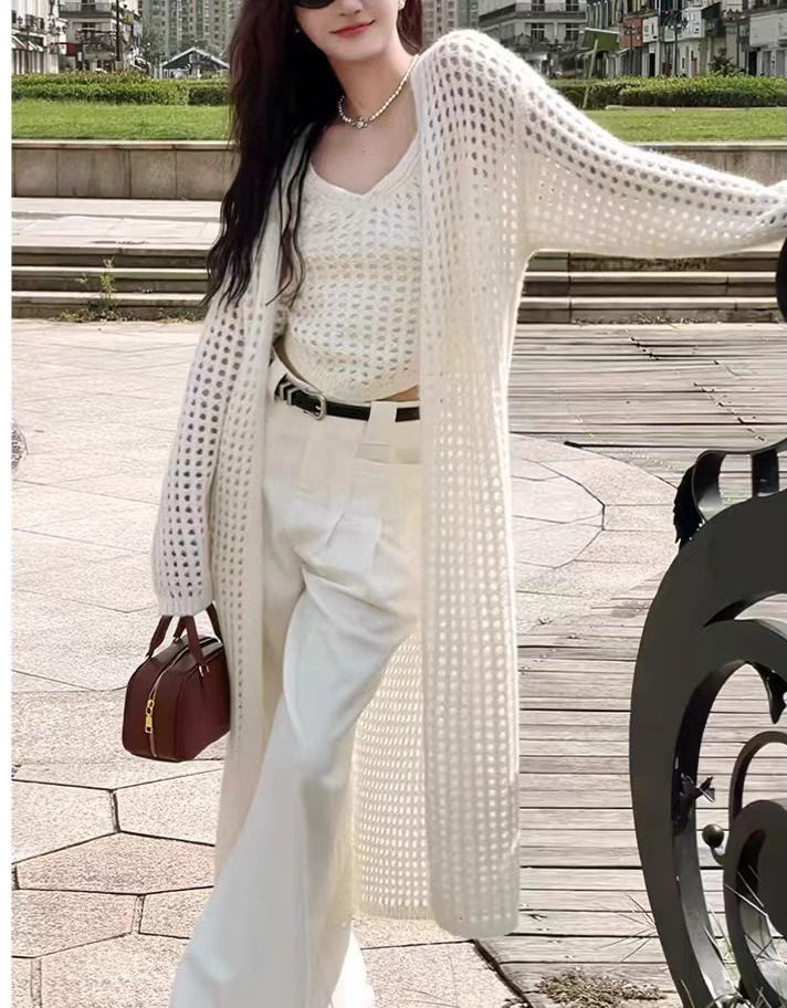 New spring and summer Korean versatile design sense hollow versatile cardigan thin hook-up knitted sunscreen blouse for women