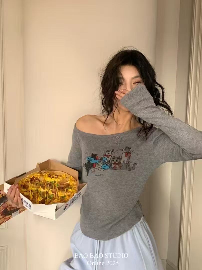 春季新款氣質辣妹純欲風斜領針織衫女卡通貓咪修身短款上衣薄