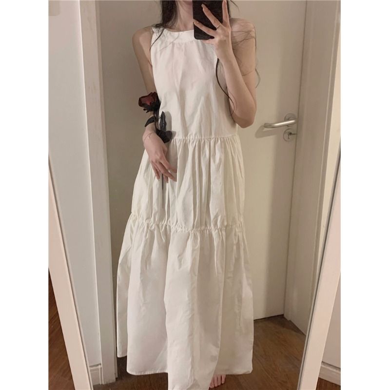 茶歇法式白色連衣裙子女裝夏季2025新款海邊度假仙女吊帶背心長裙
